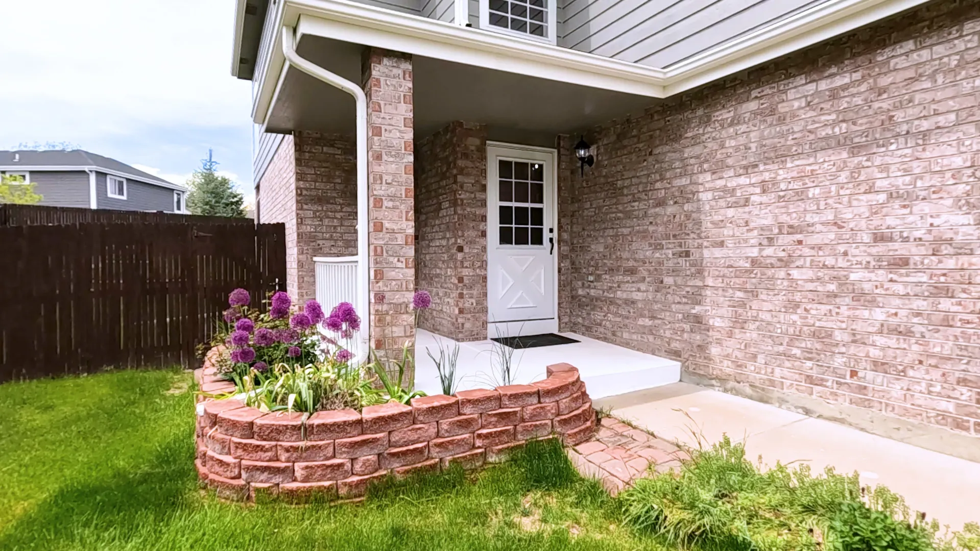 Brick siding on the exterior wall of a residential home