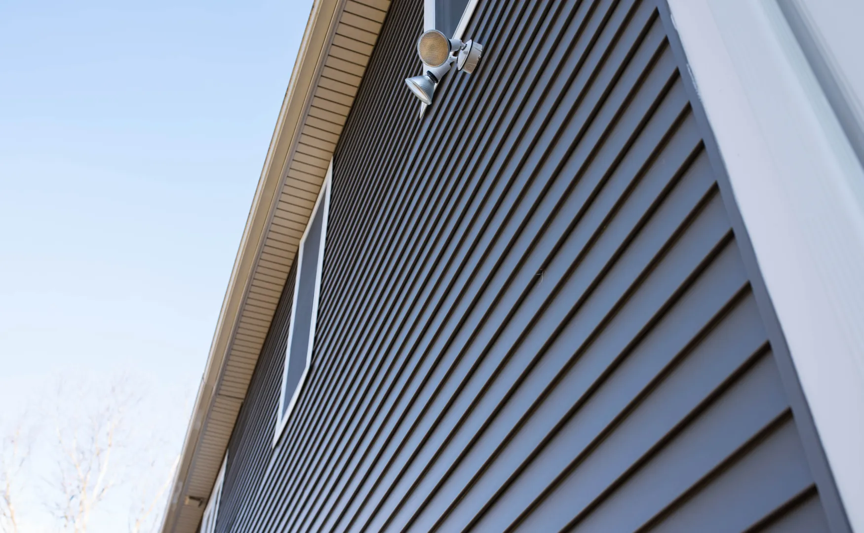 Fiber cement siding installed on the exterior wall of a house
