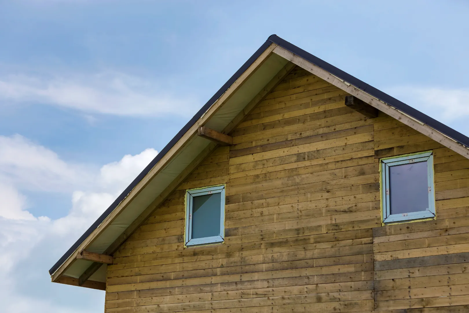 Thermally modified wood siding on a house exterior